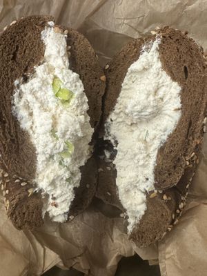 Tofu scallion on pumpernickel everything   at Liberty Bagels in New York City