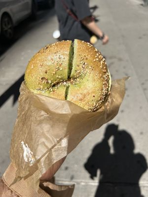 Vegan toasted jalapeno everything bagel with tofu spinach artichoke cream cheese at Liberty Bagels in New York City