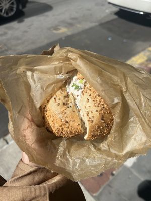 Vegan toasted garlic bagel with tofu scallion cream cheese at Liberty Bagels in New York City