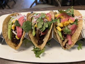 Carnita tacos which are mushroom based served with pickled onions and mango salsa. My father n law loved these.   at Spirit Elephant in Winnetka