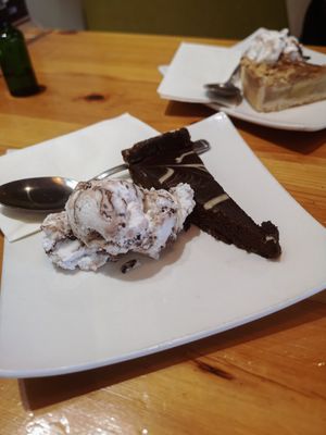 Vegan chocolate cake with ice cream at Kelly's Diner in Letterkenny