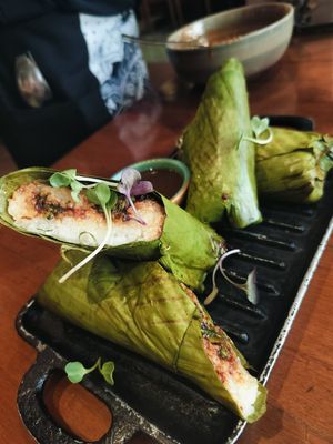 Steamed, grilled, stuffed sticky rice wrapped in banana leaves. Delicious at Burma Burma in Bangalore