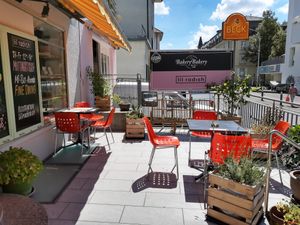 Outdoor seating at neighbouring BakeryBakery, probably free to use at lil Radish in Bern