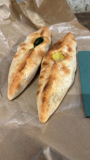 sfiha al spinaci e patate  at Santo Falafel in Florence