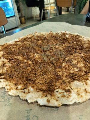 Za'atar on bread at Santo Falafel in Florence