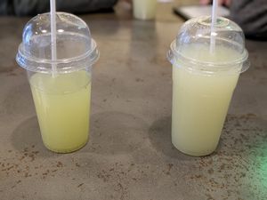 Zumo de piña izquierda y de lima derecha 3 € cada uno at Santo Falafel in Florence