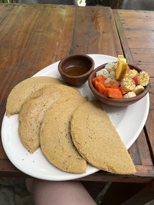 Not really pancakes, more of a patty with a bit of a raw dough/banana-y texture. Good though. Make sure to clarify if you don’t eat honey, I believe it’s the default topping  at Simon Says  in San Juan Del Sur