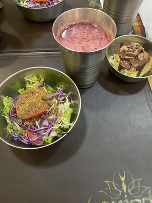 Salad, dragonfruit/passionfruit juice, and vegan cake with chocolate ganache.  at Govinda Vegetariano - Batista Campos in Belem