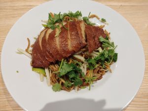 Chow mein with seitan from the permanent menu at Loving Bistro - OC Flora in Prague