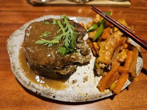 Mushroom patty and tempeh at Veganic Monkey Magic 浅草 in Tokyo