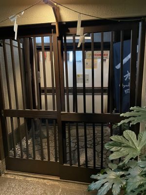 Front door entry. Open both sliding doors, remove shoes inside and open sliding door on left.  at Veganic Monkey Magic 浅草 in Tokyo