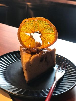 Vegan marble “ sake “ cake with dry mandarin. Taste like cheese cake! So yummy... at Veganic Monkey Magic 浅草 in Tokyo