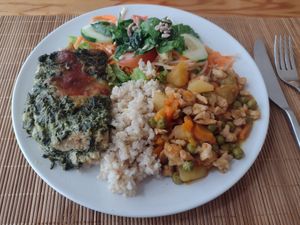 One main was breaded spinach and one main was soya chunks, potatoes, peas and carrots - we had a bit of both. at Granos Espaço Vegetariano in Lisbon