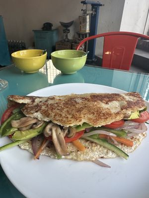 Cachapa with sautéed veggies, mushrooms and avocado   at Bienmesabe in Sucre