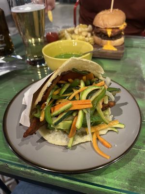 Arepa original with veggies, palta, plantain and tomato   at Bienmesabe in Sucre