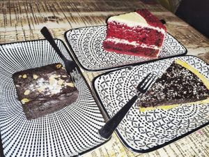 Three desserts: brownie, chocolate tart sea salt, Velvet Cake at The Hungry Tapir in Kuala Lumpur
