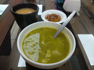 Soup, juice and peach dessert at Prana Veggie in Quito