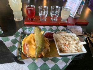 Kombucha flight and burger with gigantic pepper   at The Panacea Restaurant in Wilmington