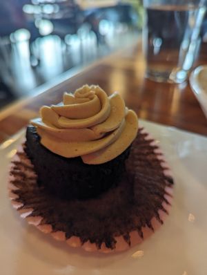 Chocolate cupcake with peanut icing.... Looked so good I forgot to take picture until I tried it l at The Panacea Restaurant in Wilmington