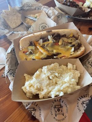 Cheesesteak was meh, would pass on in future. Grits were good but I miss vegan cheesy grits option  at The Panacea Restaurant in Wilmington
