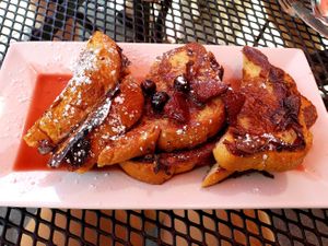 Triple Berry stuffed French toast (Sunday Brunch) - phenomally tasty and extremely filling. So perfect its easy to forget its vegan. at The Panacea Restaurant in Wilmington