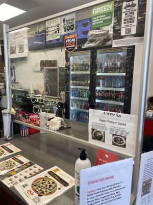Indoor Ordering Station w/Vegan Signage (Notice Kombucha in the Background)  at Pizzeria Halt in Modesto
