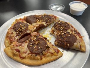 Vegan pepperoni pizza with vegan ranch   at Pizzeria Halt in Modesto