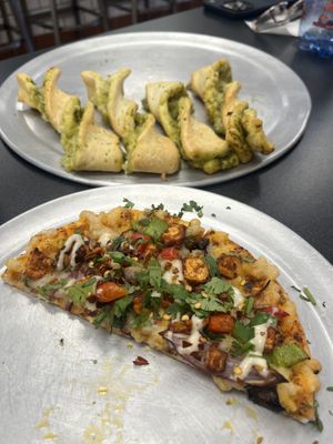 Tandoori Chicken Plant Based pizza with Cheesy Pesto plant based bread sticks  at Pizzeria Halt in Modesto