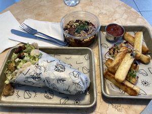 Yuca fries and shawarma seitan sandwich  at Lulu Green in Boston
