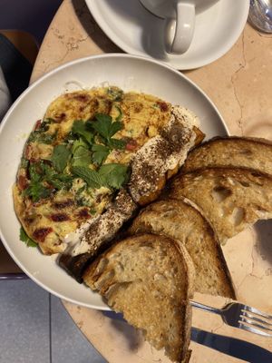 Sundried Tomato and Arugula Omelette with sweet potato and bread  at Lulu Green in Boston