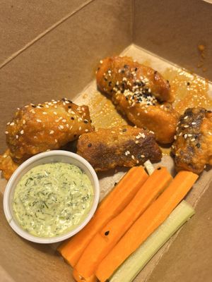 Maple hot sauce, glazed boneless wings  at Lulu Green in Boston