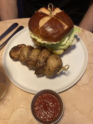 Burger with potatoes  at Lulu Green in Boston
