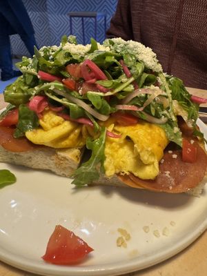Prosciutto scramble toast on focaccia   at Lulu Green in Boston