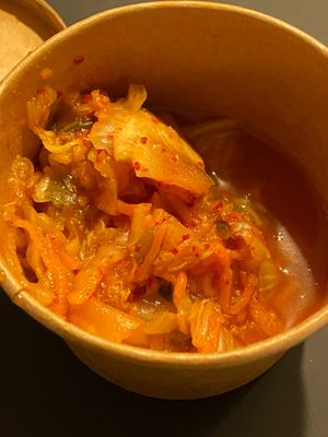 Side pot of kimchi  at Wulf & Lamb Marylebone in London