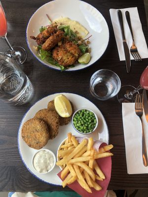 Sweet potato and zucchini fritters (top), fish cakes (bottom)  at Wulf & Lamb Marylebone in London