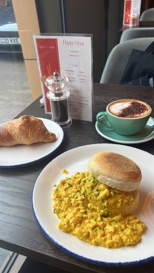 Muffin (DELICIOUS) with apricot croissant and a simple cappuccino made extra special without request, how cute   at Wulf & Lamb Marylebone in London