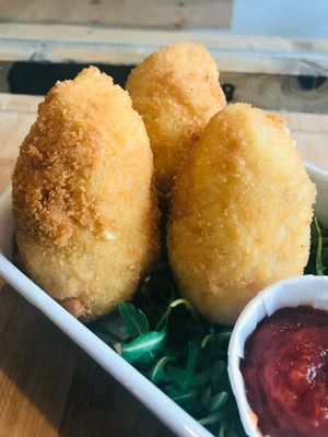 Italian supplí (cacio e Pepe) with arborio rice, black pepper & melted cheese.  at Zilch Bakery & Deli in Glasgow