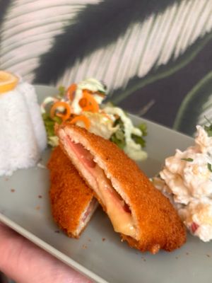 Vegan Royal Schnitzel with homemade Mayo-Potato salad or french fries, salad, rice, parsley-mayonnaise at Vegan Loving Hut Neubau in Vienna