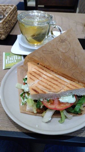 Vegan Doner Kebap with fresh veggies, and big cup of tea at Vegan Loving Hut Neubau in Vienna