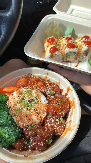 Spicy Korean fried chicken bowl and Zoro roll! at Naughty Panda in Santa Ana