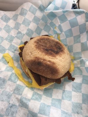 Breakfast sandwich on an english muffin with vegan bacon, egg, cheese, and mayo! Other available options included adding sausage on a croissant with spicy mayo  at Brewing Good Coffee Company in Savage