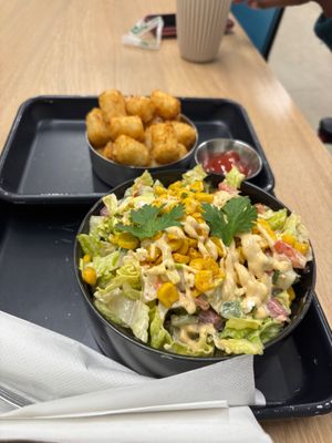 Seasonal street corn salad and side of tots at Brewing Good Coffee Company in Savage