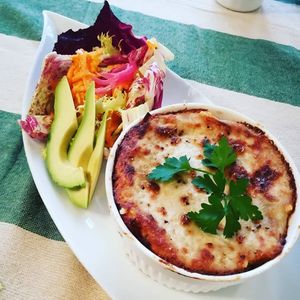 Lasagna plate ( include seasonal organic  local vegetable ). White source is made of cashew nut milk. One of popular menu for winter. at LIGHTS Vegan Team in Fukuoka