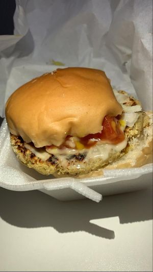 Acaraburguer (hambúrguer de feijão, picancia, dendê, vinagrete e molho). at Yeba in Fortaleza