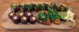 The Green Miso (back), miso glazed tofu maki (front left), seaweed inari (front right) at Vegan Sushi Bar - Kinkerstraat in Amsterdam