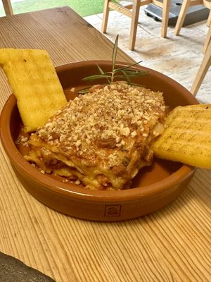 Lasagna with polenta on the side.  at Avocadisimo in Gran Canaria