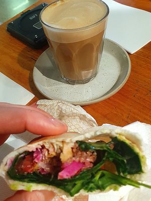 Vegan shwarma wrap and soy latte at Oasis in Murrumbeena