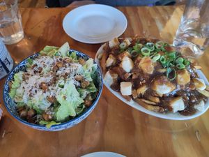 Cesar salad and small poutine at Maynard in Montreal