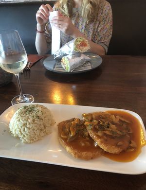 Schnitzel with mushrooms and rice & the falafel wrap  at Pesami in Kleve