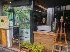 They literally sell dead-chickens-on-a-stick. This is *not* a vegetarian restaurant. at Curly & Pizza in Quito